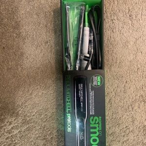 Paul Mitchell flat iron. Never used still in box